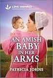 An Amish Baby in Her Arms: An Uplifting Inspirational Romance (Amish Chocolate Shop Brides, 1)