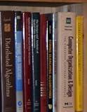 Segment of a Super Programmers Bookshelf: Top Flight Software Engineers Need Lots of Books and Here are a few.